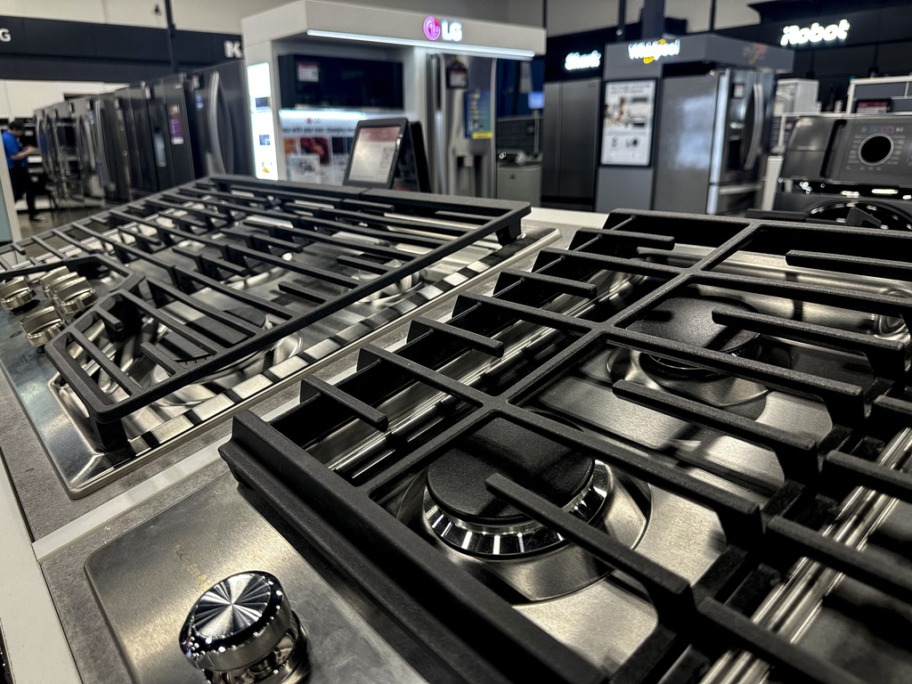 New appliances are displayed for sale at a store in Kennesaw, Ga., on Thursday, Aug. 14, 2025. (AP Photo/Mike Stewart)