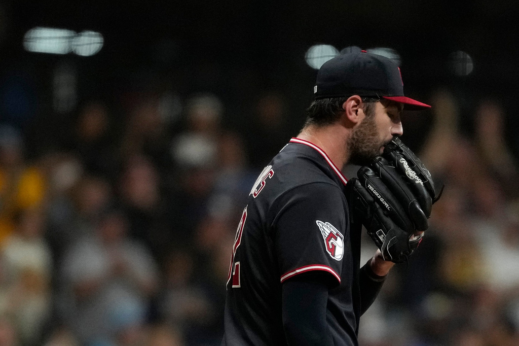 Cleveland Guardians' Gavin Williams reacts after giving up a two-run home run to Milwaukee Brewers' Jackson Chourio during the fourth inning of a baseball game Wednesday, June 17, 2026, in Milwaukee. (AP Photo/Aaron Gash)