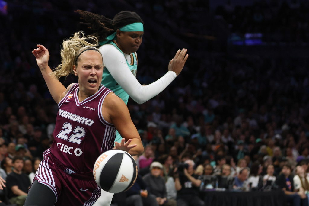 Toronto Tempo guard Julie Allemand (22) collides with New York Liberty center Jonquel Jones during the second half of a WNBA basketball game, Wednesday, June 3, 2026, in New York. (AP Photo/Heather Khalifa)