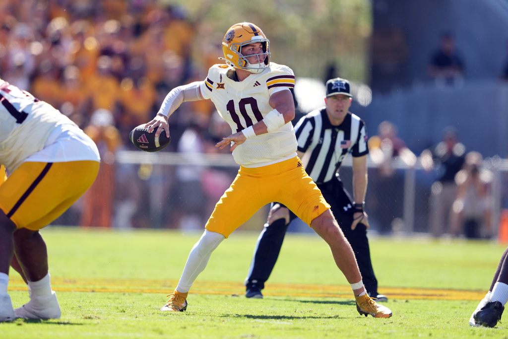 Arizona State quarterback Sam Leavitt (10) looks to throw the ball against Texas Tech in the first half of an NCAA college football game, Saturday, Oct. 18, 2025, in Tempe, Ariz. (AP Photo/Rick Scuteri)