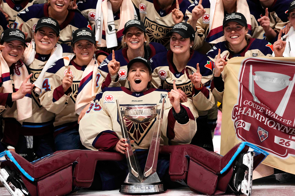 FILE - The Montreal Victoire pose for a photo with the PWHL Walter Cup after the team's win against the Ottawa Charge, in Ottawa, May 20, 2026. (Justin Tang/The Canadian Press via AP, File)