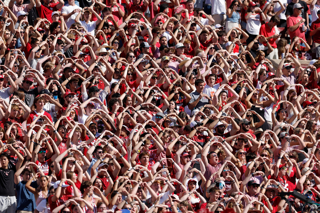Oklahoma fans cheer for their team during the first half of an NCAA college football game against Kent State, Saturday, Oct. 4, 2025, in Norman, Okla. (AP Photo/Alonzo Adams)