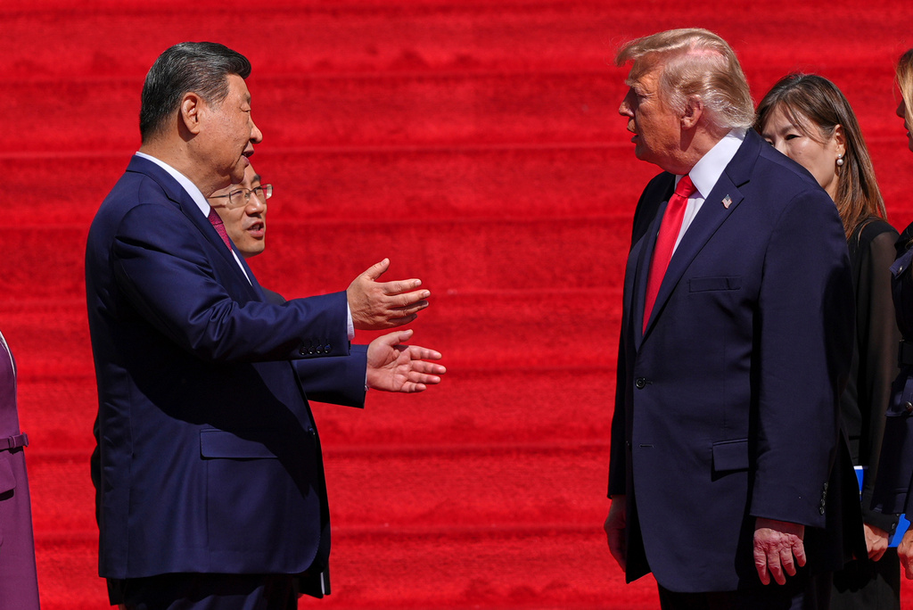 China's President Xi Jinping, left, speaks with President Donald Trump on the steps of the National Archives Museum, Friday, Sept. 25, 2026, in Washington. (AP Photo/Julia Demaree Nikhinson)