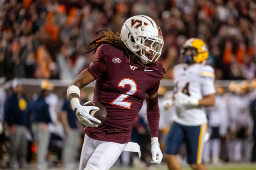 Virginia Tech wide receiver Takye Heath (2) runs in for a touchdown during an NCAA college football game between California and Virginia Tech, Friday Oct. 24, 2025, in Blacksburg, Va., (AP Photo/Robert Simmons) Virginia Tech wide receiver Takye Heath (2) runs in for a touchdown during an NCAA college football game between California and Virginia Tech, Friday Oct. 24, 2025, in Blacksburg, Va., (AP Photo/Robert Simmons)
