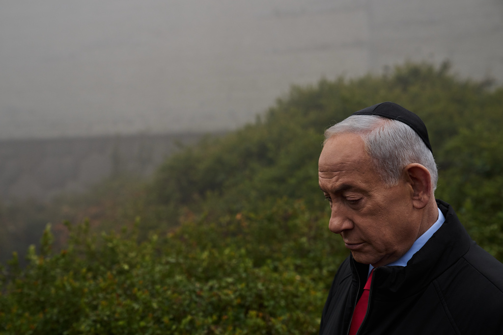 Israel's Prime Minister Benjamin Netanyahu walks on area at the Yad Vashem Holocaust Memorial Museum during a visit with the Indian Prime Minister Narendra Modi, in Jerusalem, Thursday, Feb. 26, 2026. (AP Photo/Leo Correa)