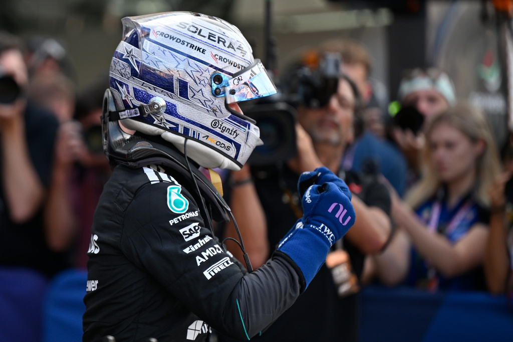 Mercedes driver Andrea Kimi Antonelli of Italy celebrates after setting the pole position during the qualifying session for the Monaco F1 Grand Prix, at the Monaco racetrack, Saturday, June 6, 2026. (AP Photo/Philippe Magoni)