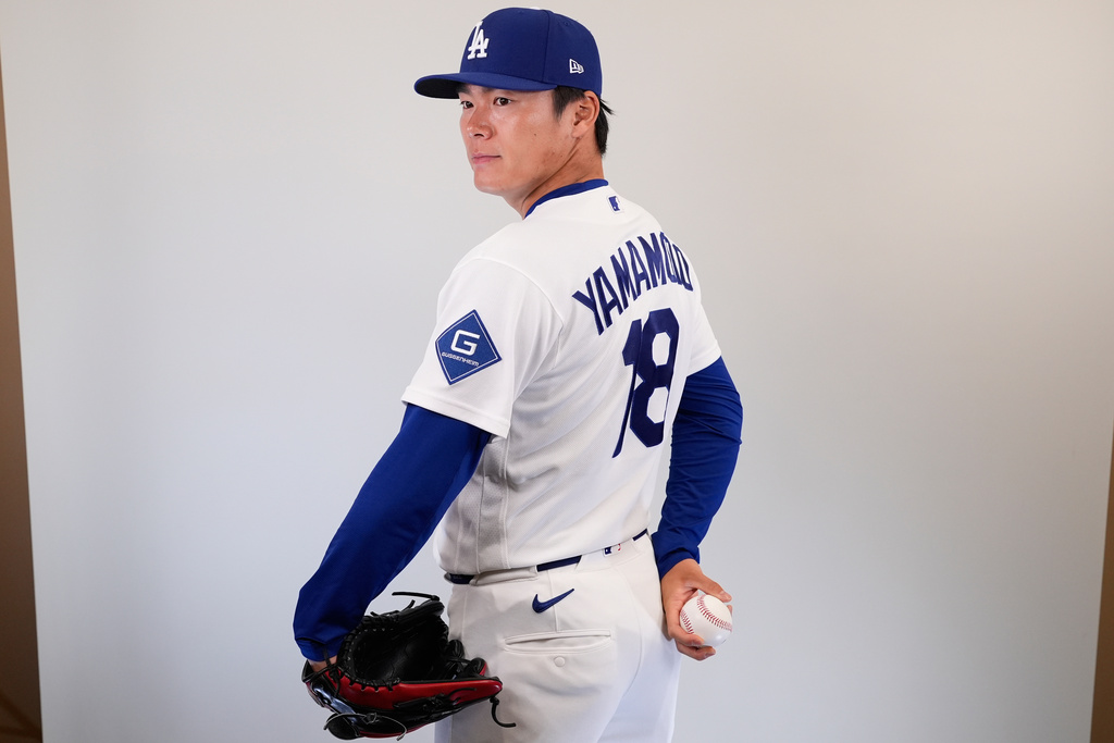 This is a 2026 photo of Yoshinobu Yamamoto of the Los Angeles Dodgers baseball team. The images reflects the Los Angeles Dodgers active roster as of Thursday, Feb. 19, 2026, in Phoenix, when this image was taken. (AP Photo/Brynn Anderson)
