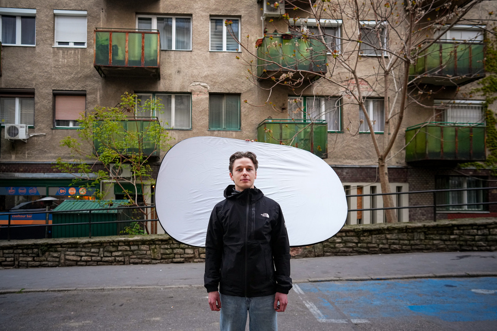 Jakab Szilagyi-Trefas, 22, poses for a portrait in Budapest, Hungary, Monday, April 13, 2026. "Young people brought out the bravery of society." (AP Photo/Petr David Josek)