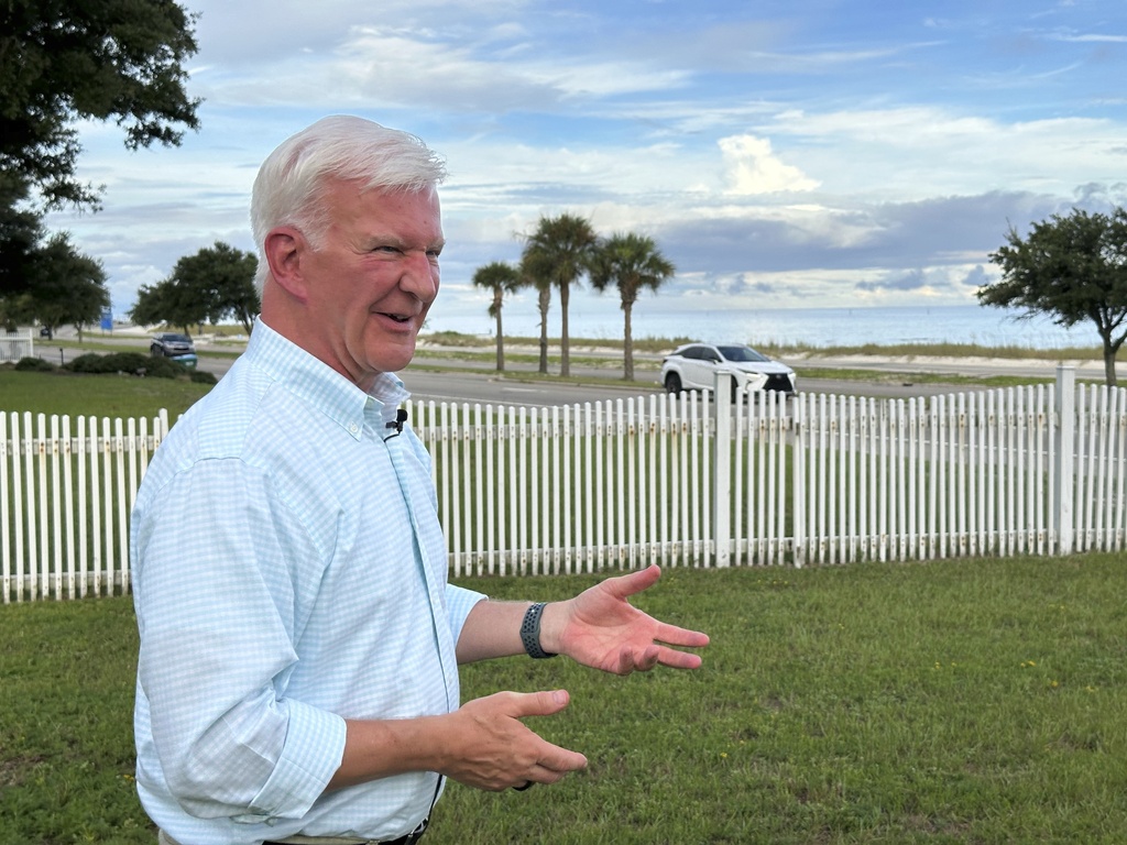 Overlooking the Mississippi Sound, Allen Baker talks in front of his home, Aug. 12, 2025, in Gulfport, Miss. (AP Photo/Jeff Amy)