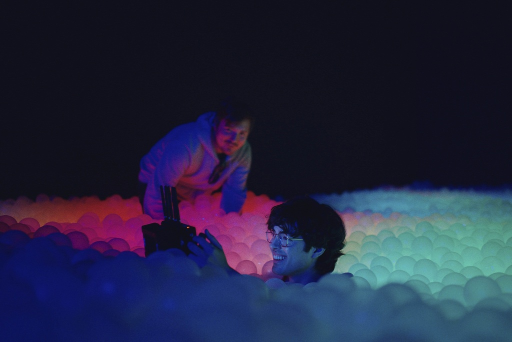 This image released by Roadside Attractions shows Dylan O'Brien, left, and James Sweeney in a scene from "Twinless." (Roadside Attractions via AP)
