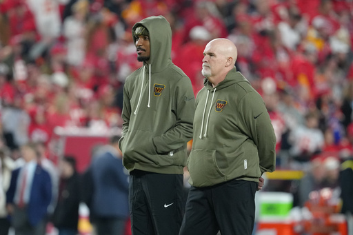 Washington Commanders head coach Dan Quinn, right, stands with quarterback Jayden Daniels before an NFL football game against the Kansas City Chiefs Monday, Oct. 27, 2025, in Kansas City, Mo. (AP Photo/Ed Zurga) Washington Commanders head coach Dan Quinn, right, stands with quarterback Jayden Daniels before an NFL football game against the Kansas City Chiefs Monday, Oct. 27, 2025, in Kansas City, Mo. (AP Photo/Ed Zurga)