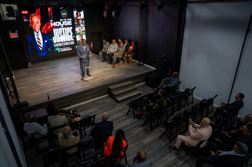 National Action Network (NAN) Board Chairman Rev. Dr. W. Franklyn Richardson welcomes people to the new location of the NAN House of Justice on Tuesday, June 16, 2026 in New York. (AP Photo/Anna Connors)