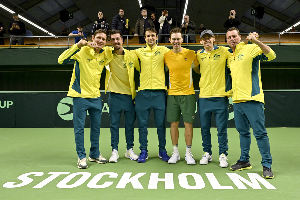 FILE - Team captain Lleyton Hewitt, right, poses with, from left, Australia's Matthew Ebden, Thanasi Kokkinakis, Aleksandar Vukic, John Peers, and Alex De Minaur after the Davis Cup tennis match between Sweden and Australia at the Royal Tennis Hall in Stockholm, Saturday Feb. 1, 2025. (Jonas Ekströmer/News Agency via AP, File)