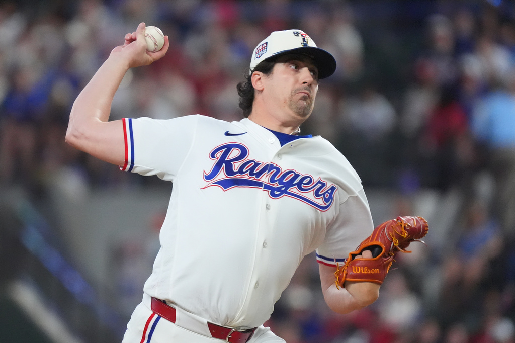 Texas Rangers pitcher Cal Quantrill throws during the first inning of a baseball game against the Detroit Tigers, Saturday, July 4, 2026, in Arlington, Texas. (AP Photo/LM Otero)