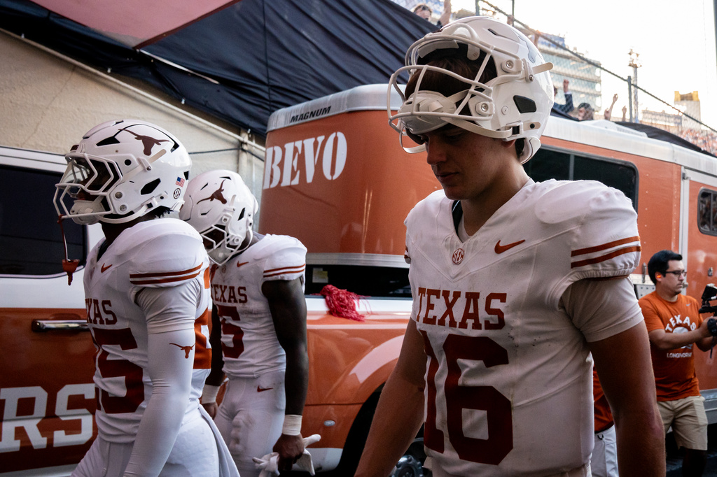 Texas quarterback Arch Manning (16) heads to the locker room following a loss to Oklahoma in the Red River Rivalry NCAA college football game in Dallas, Saturday, Oct. 10, 2026. (Sara Diggins/The San Antonio Express-News via AP)