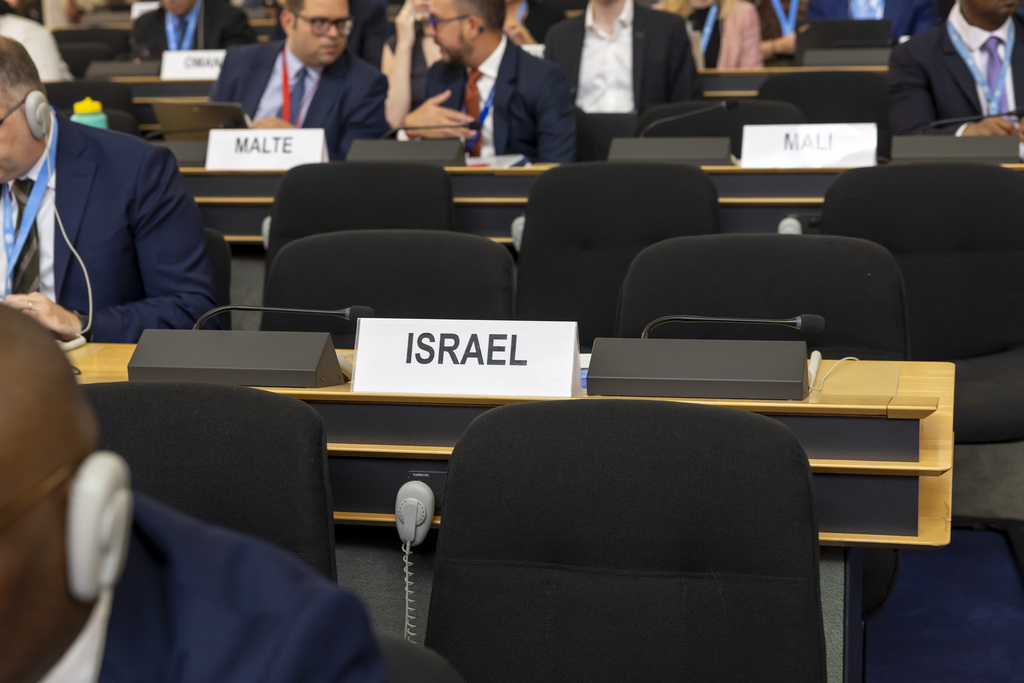 The empty seat of the Israeli delegation, during the 60th session of the Human Rights Council, at the European headquarters of the United Nations in Geneva, Switzerland, Monday, Sept. 8, 2025. (Salvatore Di Nolfi/Keystone via AP)