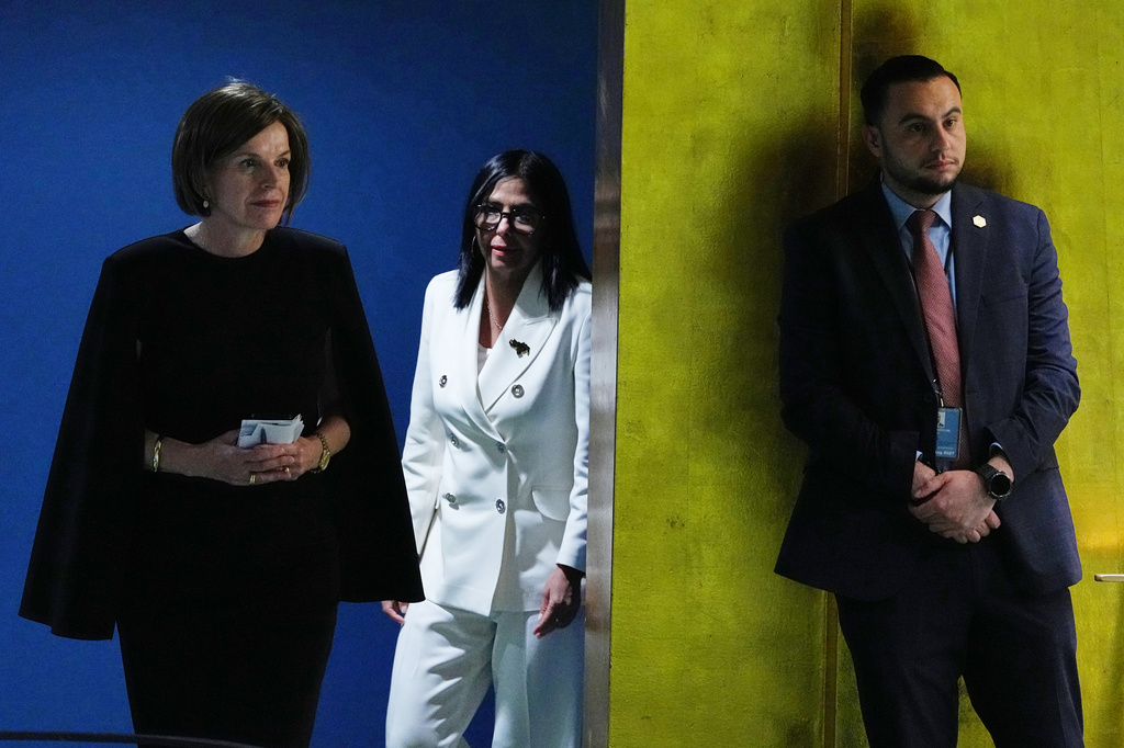 Delcy Rodríguez, acting president of Venezuela, is escorted to the podium to address the 81st session of the United Nations General Assembly at U.N. headquarters Wednesday, Sept. 23, 2026. (AP Photo/Frank Franklin II)