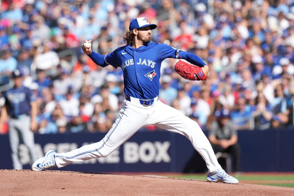 Toronto Blue Jays pitcher Kevin Gausman throws against the Tampa Bay Rays during first-inning baseball game action in Toronto, Sunday, Sept. 28, 2025. (Chris Young/The Canadian Press via AP)