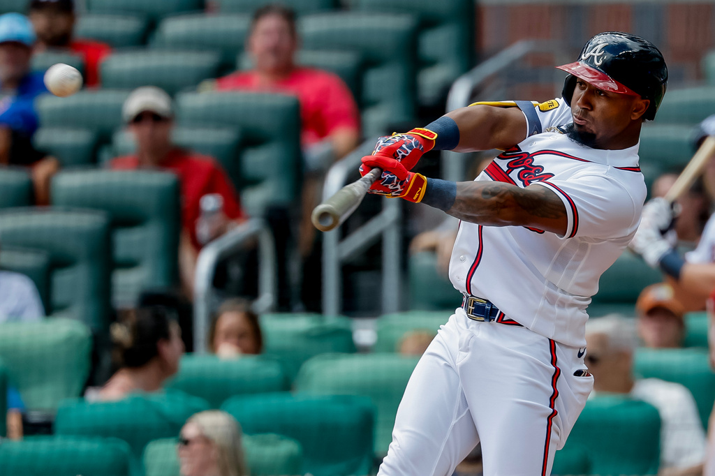 Atlanta Braves' Ozzie Albies hits a pinch-hit triple against the Tampa Bay Rays during the eighth inning of a baseball game, Thursday, Sept. 10, 2026, in Atlanta. (AP Photo/Erik S. Lesser)