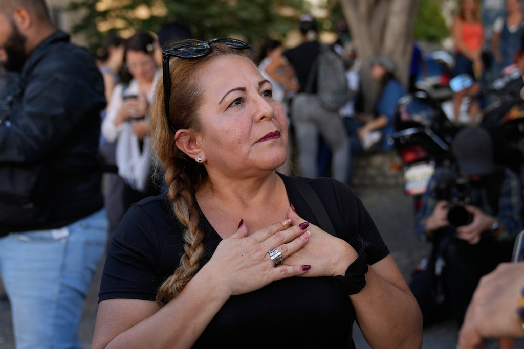 Atali Freites, the mother of Juan Jose Freites, arrives near El Helicoide, headquarters of Venezuela's intelligence service (SEBIN) and a detention center, in Caracas, Venezuela, Thursday, Jan. 8, 2026, after hearing National Assembly President Jorge Rodriguez say the government would release Venezuelan and foreign prisoners. (AP Photo/Ariana Cubillos)