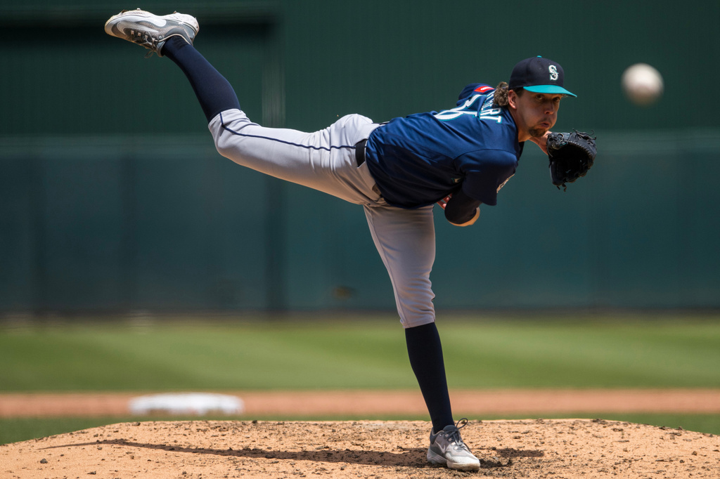 Seattle Mariners pitcher Logan Gilbert (36) throws during the fifth inning of a baseball game against the Athletics in West Sacramento, Calif., Wednesday, May 27, 2026. (AP Photo/Nic Coury)
