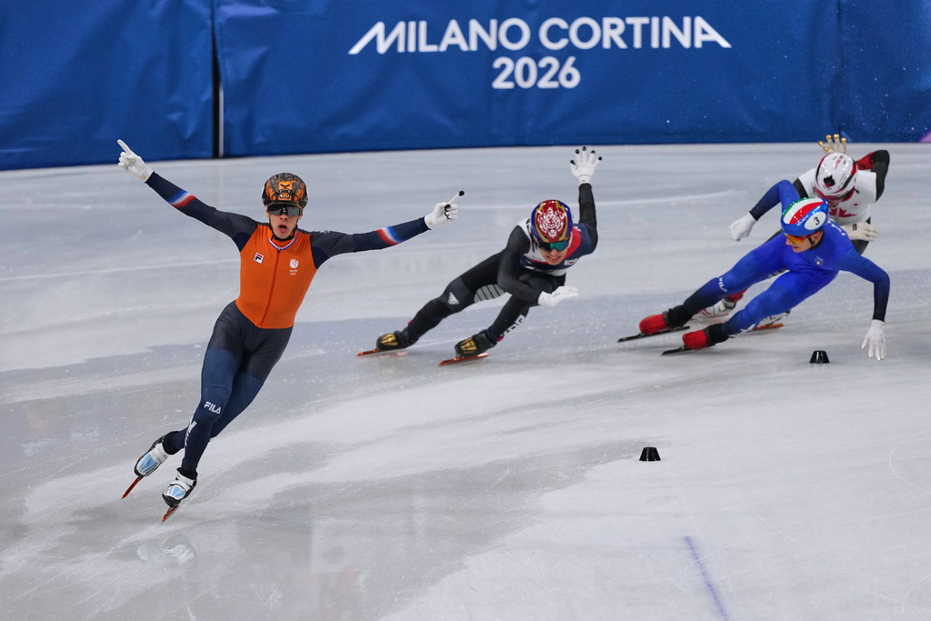 Jens van 't Wout of the Netherlands celebrates during a short track speed skating men's 5000 meters relay final at the 2026 Winter Olympics, in Milan, Italy, Friday, Feb. 20, 2026. (AP Photo/Stephanie Scarbrough)