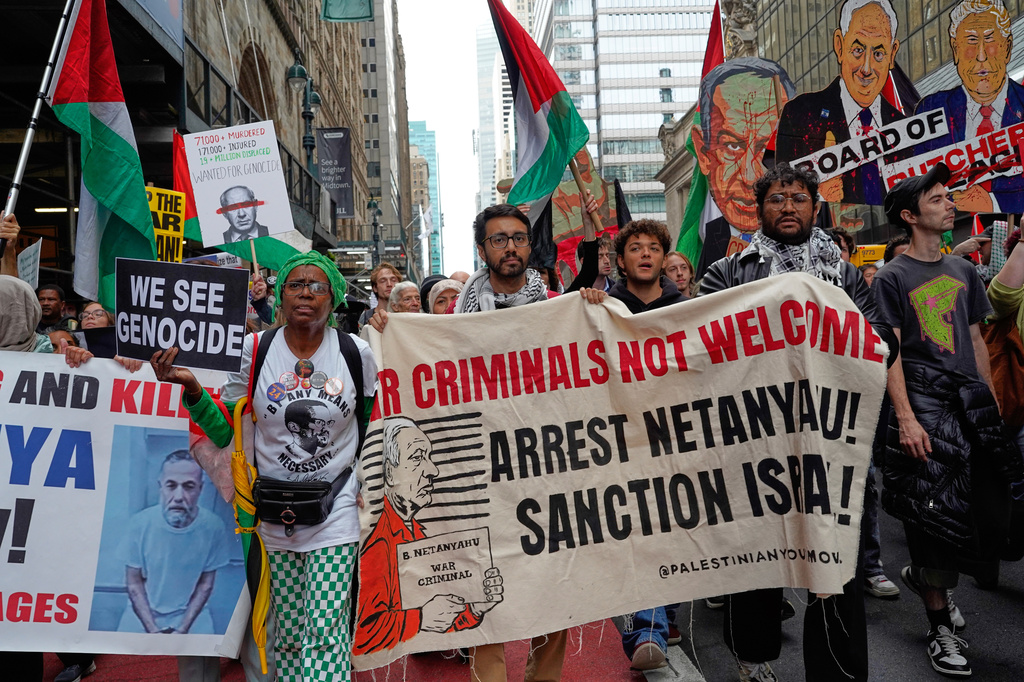 Demonstrators gather to protest following Israeli Prime Minister Benjamin Netanyahu's address at the 81st session of the United Nations General Assembly, Thursday, Sept. 24, 2026, in New York. (AP Photo/Madison Swart)
