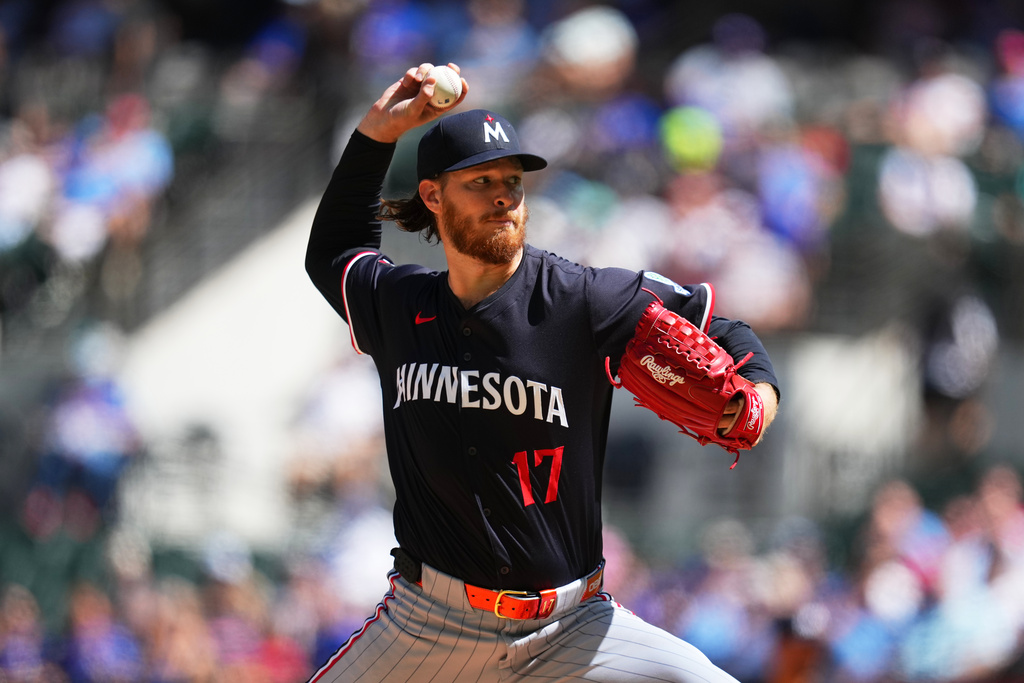 Minnesota Twins starting pitcher Bailey Ober throws against the Texas Rangers during the first inning of a baseball game Thursday, Sept. 25, 2025, in Arlington. (AP Photo/Julio Cortez)
