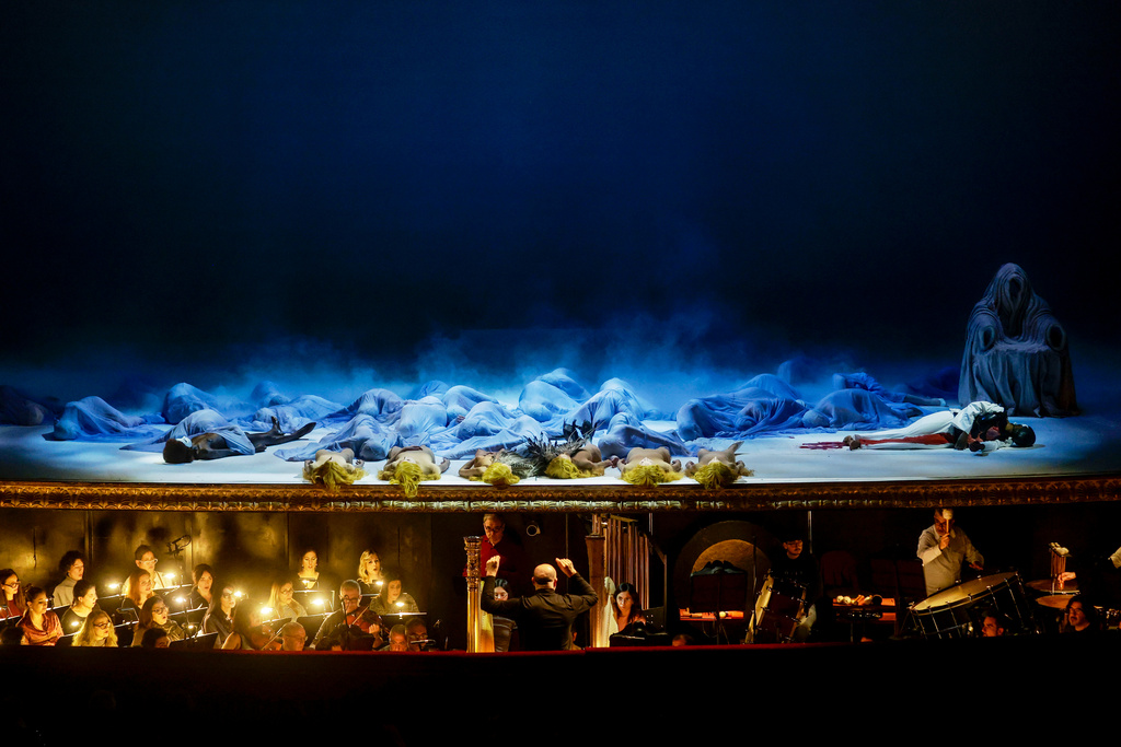 Actors perform during the general rehearsal of Ennio Morricone's only opera, Partenope, at the San Carlo Theatre, in Naples, Italy, Thursday, Dec. 11, 2025. (AP Photo/Salvatore Laporta)