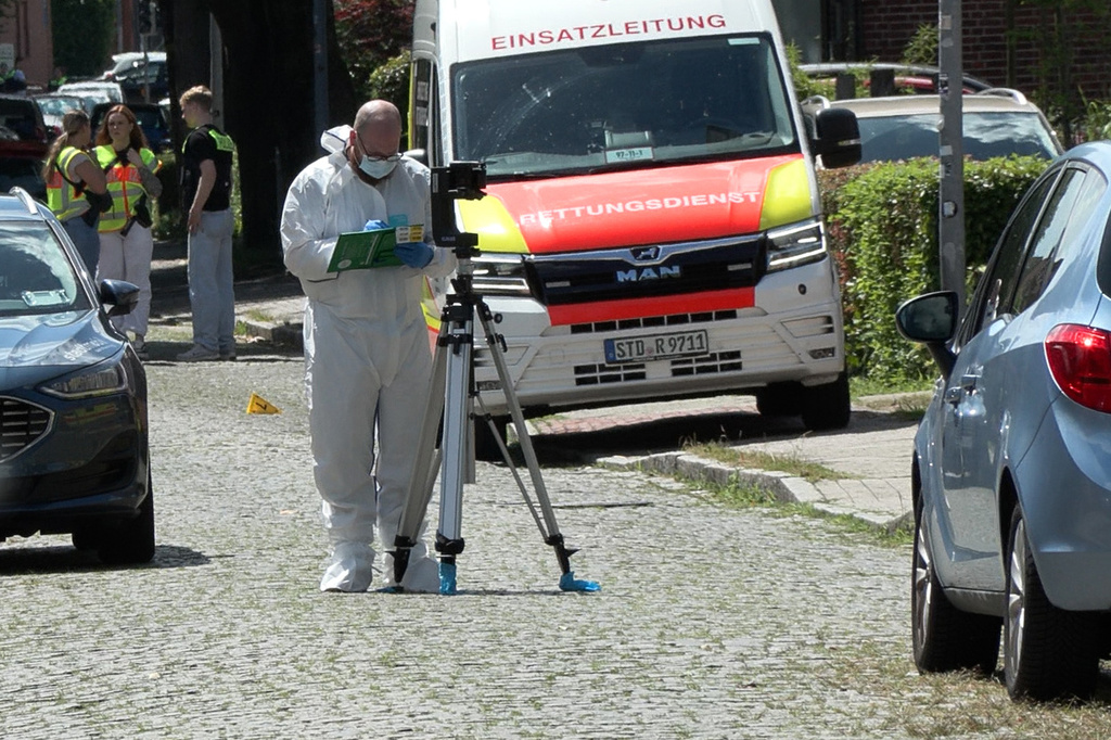 Emergency responders and forensic investigators in Stade, Germany, Monday, June 29, 2026 as police say five people have been killed in a shooting. (Fabian Höfig/NEWS5/dpa via AP)