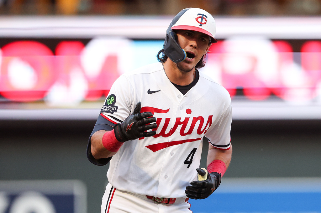 Minnesota Twins' Tristan Gray celebrates after his grand slam against the Chicago White Sox during the fourth inning of a baseball game, Monday, June 1, 2026, in Minneapolis. (AP Photo/Matt Krohn)