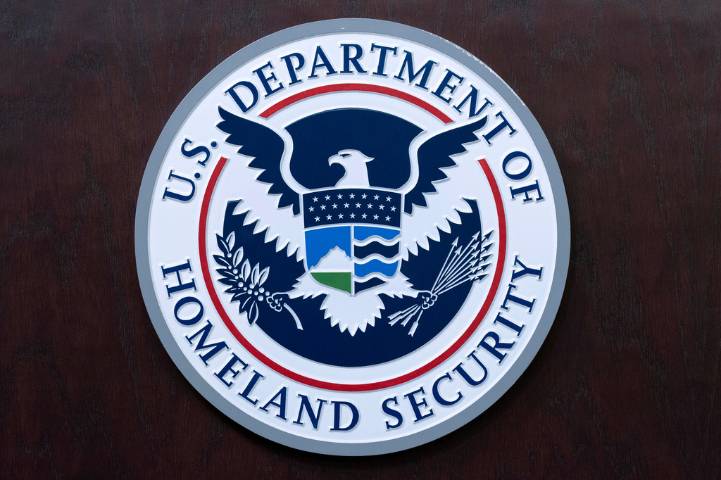 FILE - The seal of U.S. Department of Homeland Security is seen before a news conference at ICE Headquarters in Washington, May 21, 2025. (AP Photo/Jose Luis Magana, File)