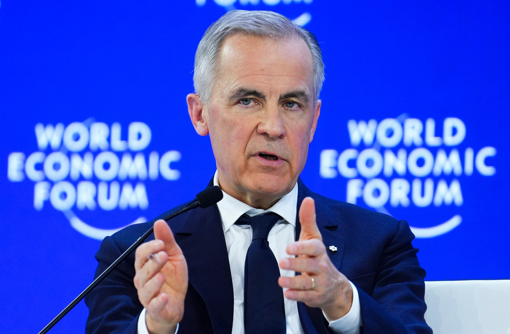 FILE - Canada Prime Minister Mark Carney delivers a speech at the World Economic Forum in Davos, Switzerland on Tuesday, Jan. 20, 2026. (Sean Kilpatrick/The Canadian Press via AP, File)