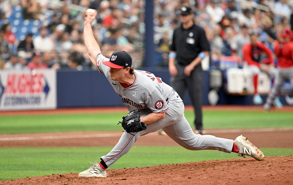 Washington Nationals pitcher Gus Varland throws during the fifth inning of a baseball game against the Tampa Bay Rays, Sunday, June 21, 2026, in St. Petersburg, Fla. (AP Photo/Jason Behnken)
