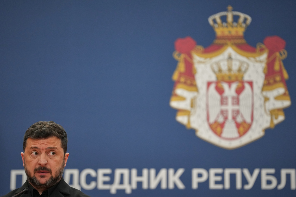 Ukraine's President Volodymyr Zelenskyy grimaces during a press conference with his Serbian counterpart Aleksandar Vucic at the Serbia Palace, in Belgrade, Serbia, Saturday, Aug. 8, 2026. (AP Photo/Darko Vojinovic)