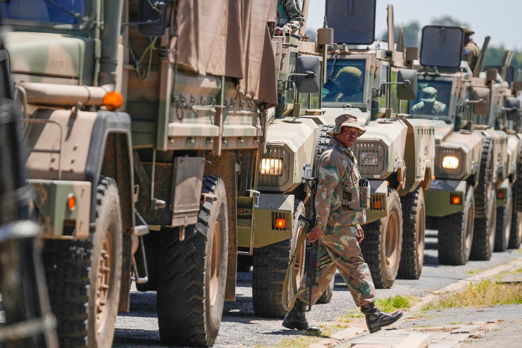 South African National Defense Forces deploy in the Riverlea township of Johannesburg, South Africa, Wednesday, March 11, 2026. (AP Photo/Themba Hadebe)