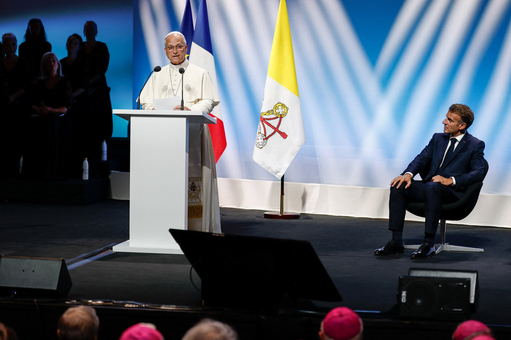 French President Emmanuel Macron looks on as Pope Leo XIV speaks at the meeting "At the Roots of Europe for Peace and Unity", in Metz, France, Monday, Sept. 28, 2026. (Benoit Tessier/Pool Photo via AP)