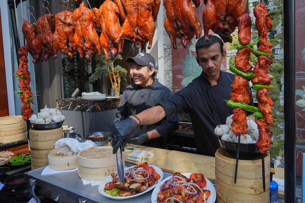 Chicken tikka is served at the South Beach Wine and Food Festival Friday, Feb. 20, 2026, in Miami Beach, Fla. (AP Photo/Marta Lavandier)