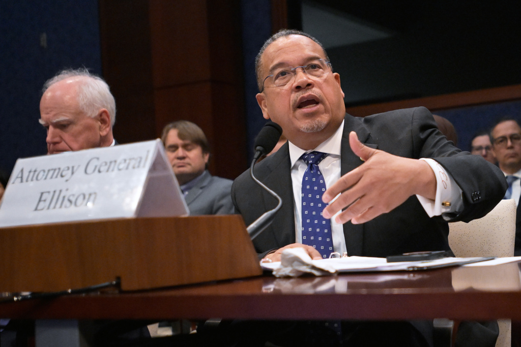 Minnesota Attorney General Keith Ellison, listens during a House Committee on Oversight and Government Reform hearing on oversight of fraud and misuse of Federal funds in Minnesota, Wed., March 4, 2026, on Capitol Hill in Washington. Seated left is Gov. Tim Walz, D-Minn. (AP Photo/Rod Lamkey, Jr.)