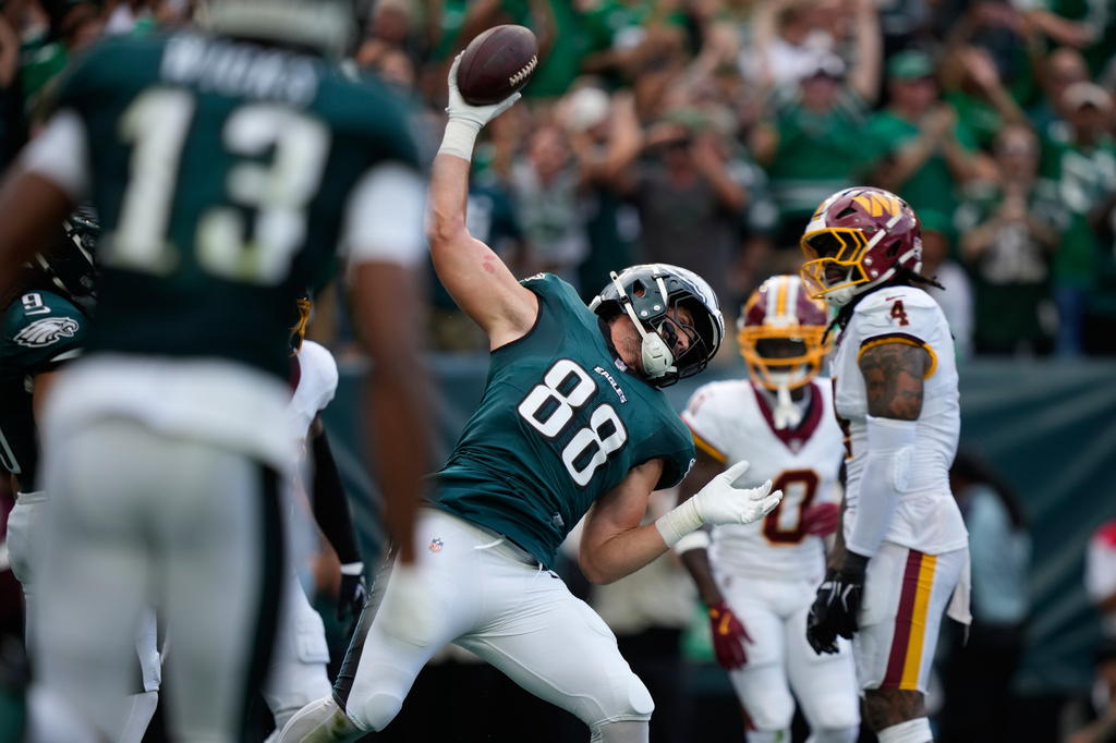 Philadelphia Eagles tight end Dallas Goedert (88) celebrates his touchdown catch against the Washington Commanders during the first half of an NFL football game, Sunday, Sept. 13, 2026, in Philadelphia. (AP Photo/Matt Slocum)