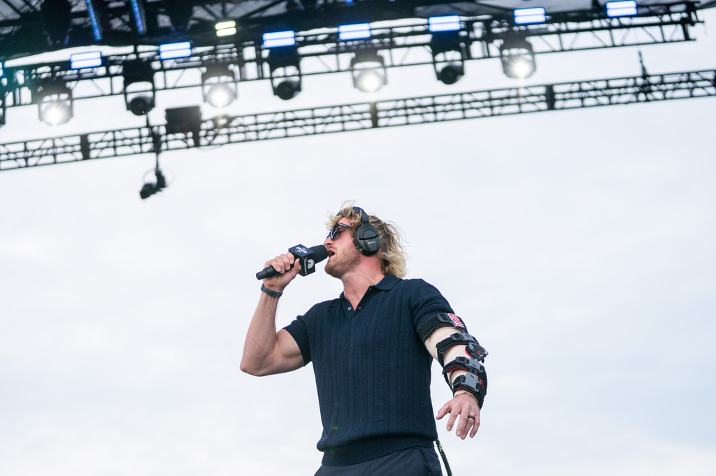 IMPAULSIVE co-host Logan Paul speaks at UFC Fan Fest on the White House Ellipse ahead of the fights on the South Lawn, Sunday, June 14, 2026, in Washington. (AP Photo/Allison Robbert)