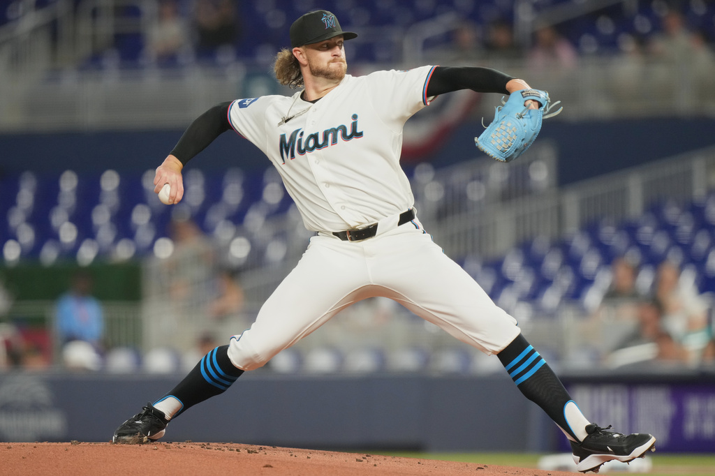 Miami Marlins starting pitcher Chris Paddack aims a pitch during the first inning of a baseball game against the Chicago White Sox Monday, March 30, 2026, in Miami. (AP Photo/Marta Lavandier)