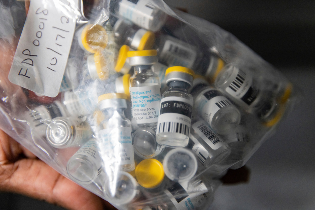 FILE - Vials of the Jynneos vaccine for monkeypox are taken from a cooler at a vaccinations site, Aug. 29, 2022, in the Brooklyn borough of New York. (AP Photo/Jeenah Moon, File)