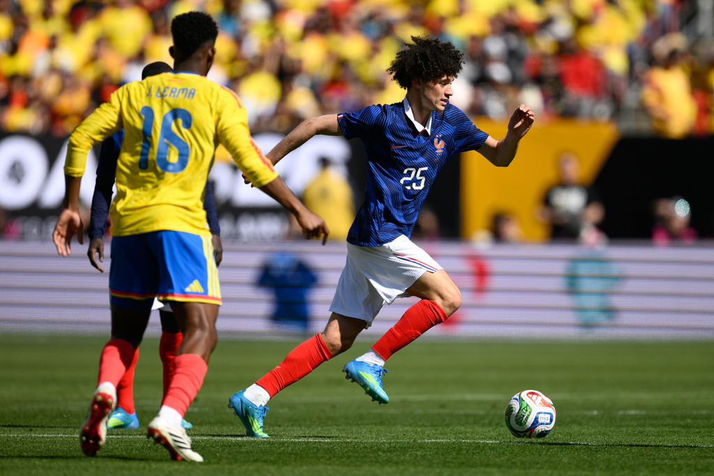 France midfielder Maghnes Akliouche (25) runs with the ball during the international friendly soccer match between Colombia and France in Landover, Md., Sunday, March 29, 2026. (AP Photo/Nick Wass)