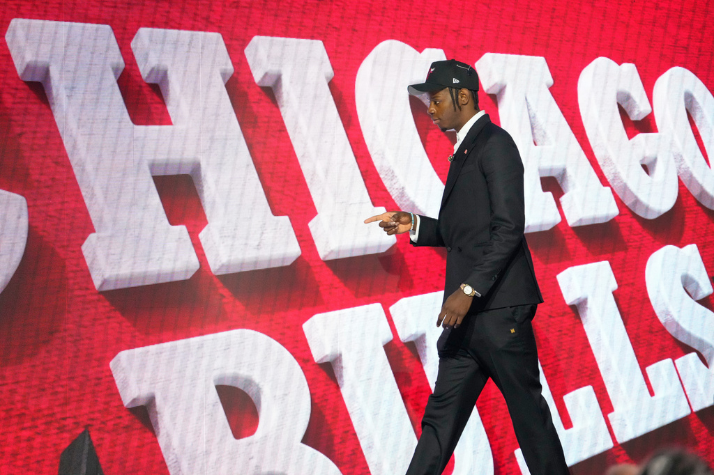 Caleb Wilson walks off the stage after being selected by the Chicago Bulls in the first round of the NBA basketball draft, Tuesday, June 23, 2026, in New York. (AP Photo/Yuki Iwamura)