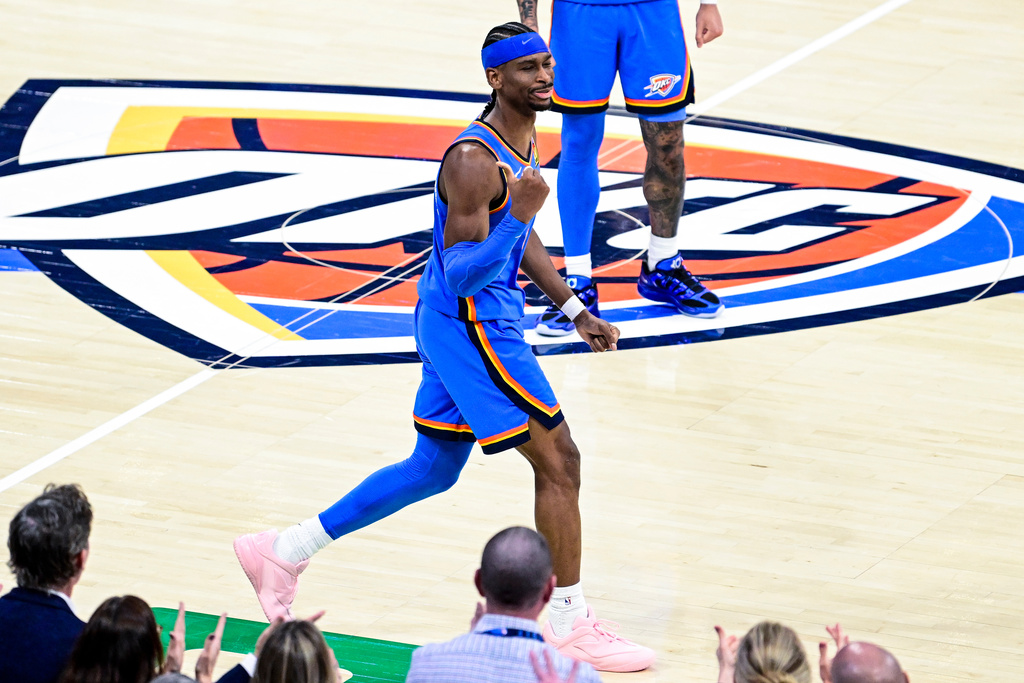 Oklahoma City Thunder guard Shai Gilgeous-Alexander (2) gestures during the second half of an NBA basketball game against the Denver Nuggets Monday, March 9, 2026, in Oklahoma City. (AP Photo/Gerald Leong)