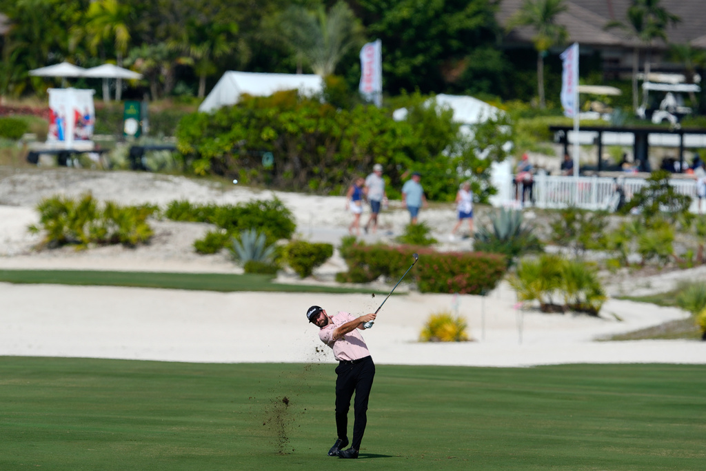 Cameron Young, of the United States, watches his shot from the first fairway during the second round of the Hero World Challenge PGA Tour at the Albany Golf Club, in New Providence, Bahamas, Friday, Dec. 5, 2025. (AP Photo/Fernando Llano)