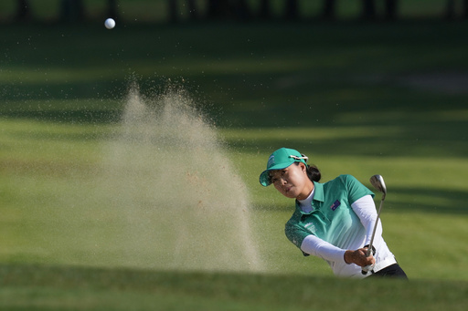 Minjee Lee of Australia hits out of a bunker on the 14th hole during the pool A match against the United States team for the LPGA International Crown golf tournament at the New Korea Country Club in Goyang, South Korea, Saturday, Oct. 25, 2025. (AP Photo/Lee Jin-man) Minjee Lee of Australia hits out of a bunker on the 14th hole during the pool A match against the United States team for the LPGA International Crown golf tournament at the New Korea Country Club in Goyang, South Korea, Saturday, Oct. 25, 2025. (AP Photo/Lee Jin-man)