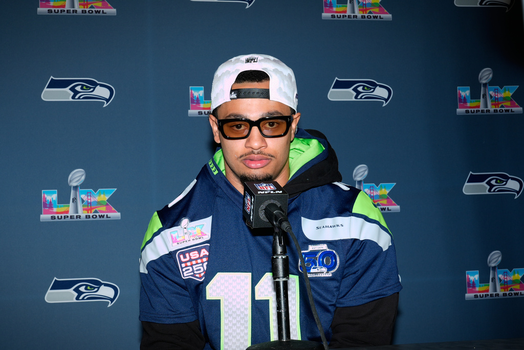 FILE - Seattle Seahawks wide receiver Jaxon Smith-Njigba speaks during a news conference on Feb. 4, 2026, in San Jose, Calif., ahead of Super Bowl 60 between the New England Patriots and the Seattle Seahawks. (AP Photo/Brynn Anderson, File)