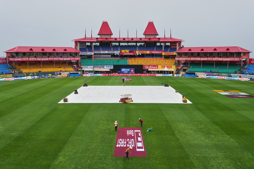 Rain covers are on at the Himachal Pradesh Cricket Association (HPCA) stadium ahead of the first ODI cricket match between Afghanistan and India in Dharamshala, India, Saturday, June 13, 2026. (AP Photo/Ashwini Bhatia)